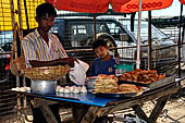 Yangon Myanmar. street sellers on Strand Rd. 